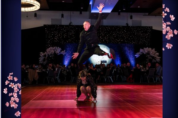 Gary Weiland launches over partner Kristine Stewart.